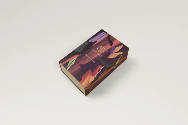 Book-style fragrance case — closed view